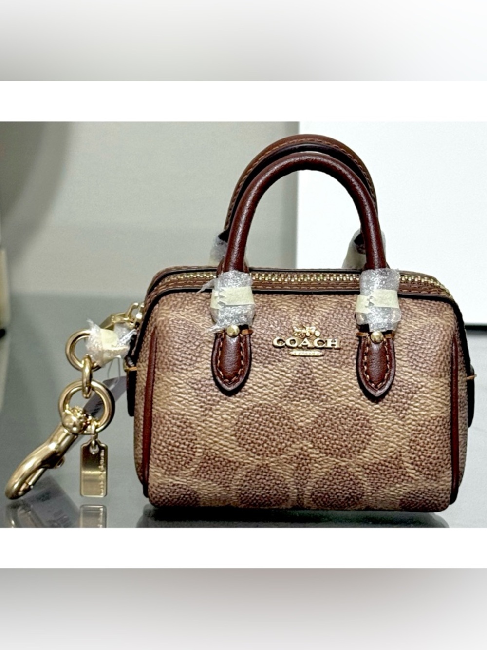 COACH Mini Rowan Bag Charm In Signature Canvas, GOLD/ TAN/ BROWN